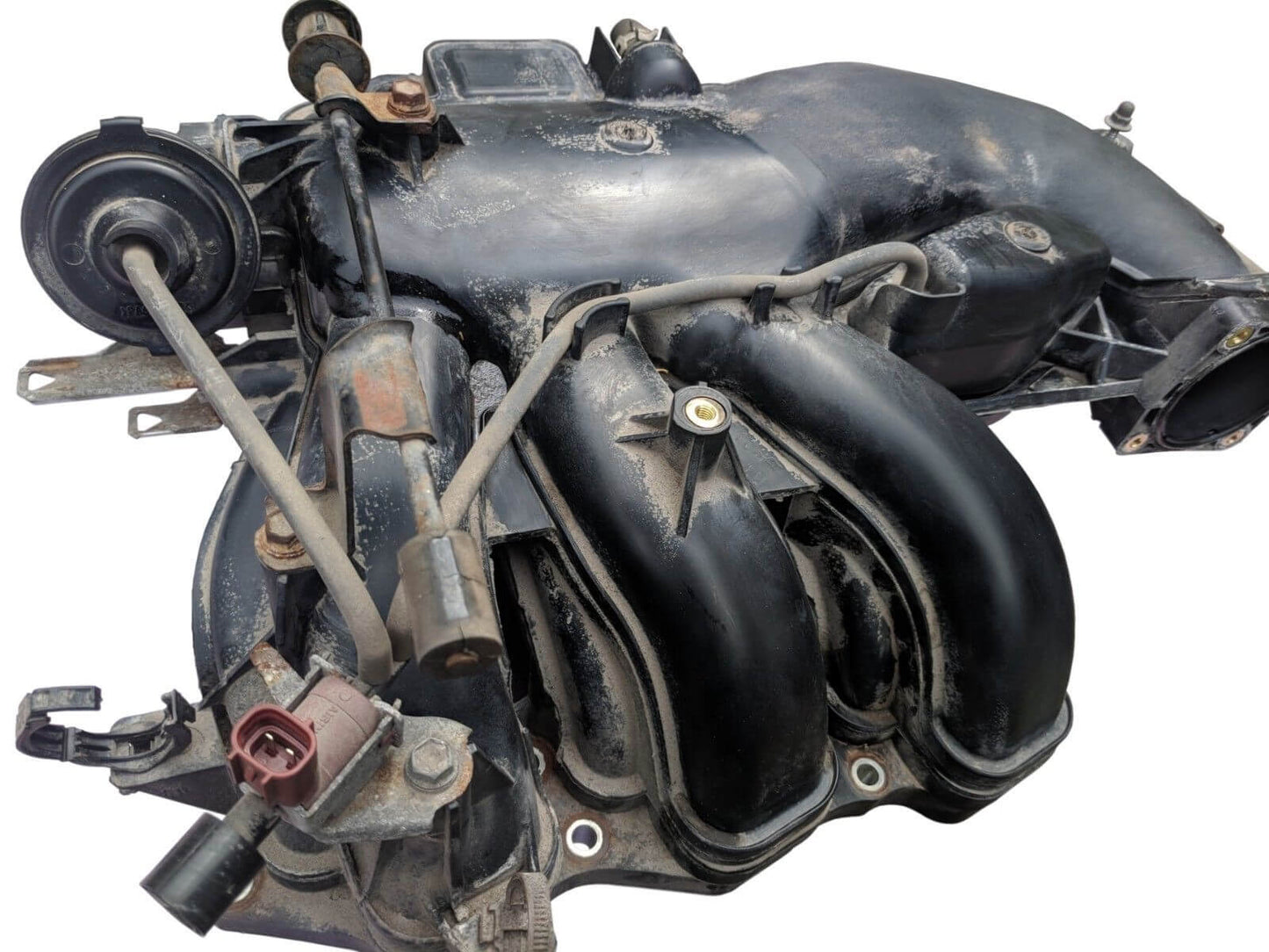 2012-2017 Toyota Prius C Engine Intake Manifold (7th and 8th VIN = B3), OEM used part in excellent condition for optimal performance.